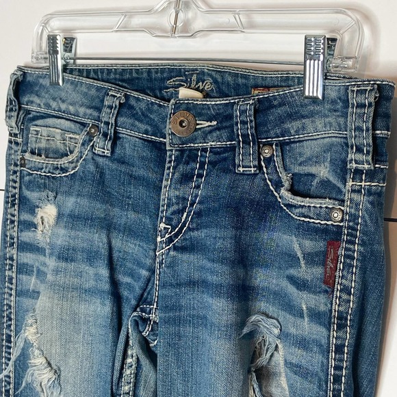 Silver Jeans, distressed jeans, flare bottom jeans, medium wash distressed jeans - Picture 4 of 12